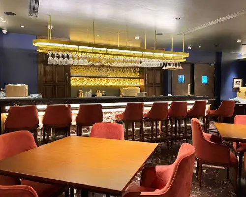 Outdoor seating with lights at Mala Akbari